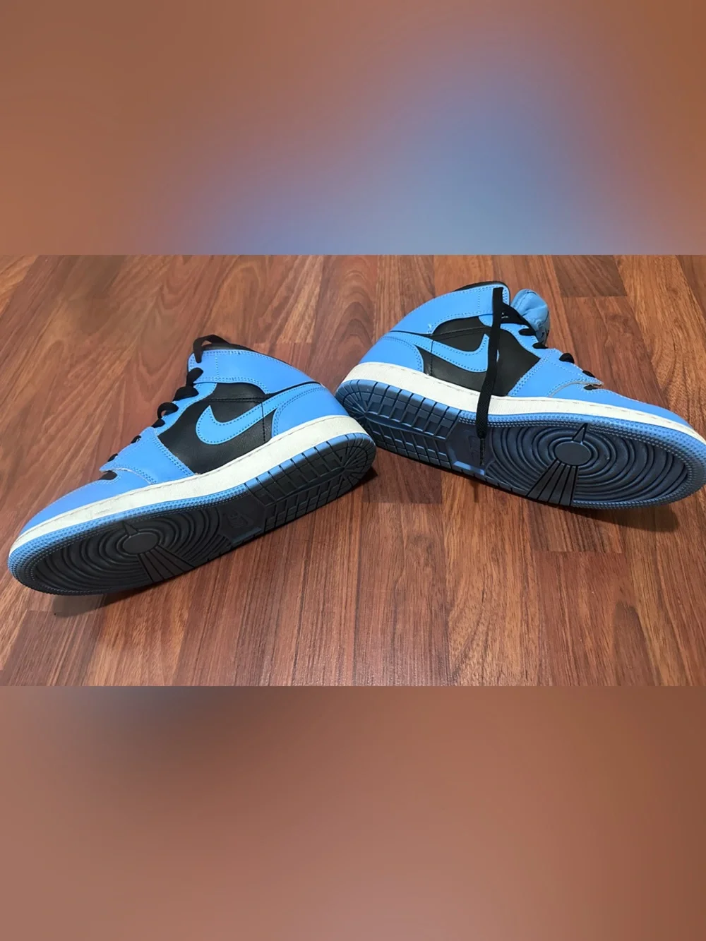 Jordan Youths Light Blue and Black High-Top Sneakers